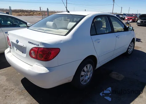 2003 Toyota Corolla Le z USA, uszkodzony, nr VIN JTDBR32E730017228